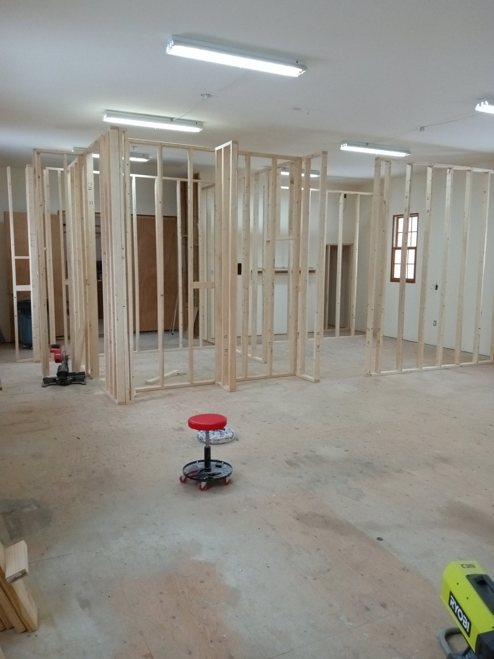 A clean room prepared for active framing and repair work