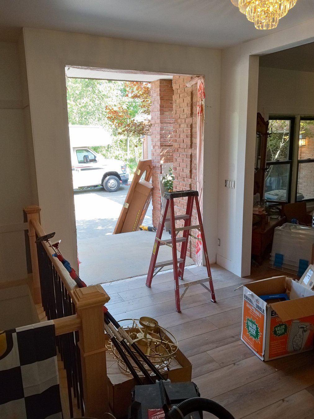 Tools and ladder positioned for a small interior job