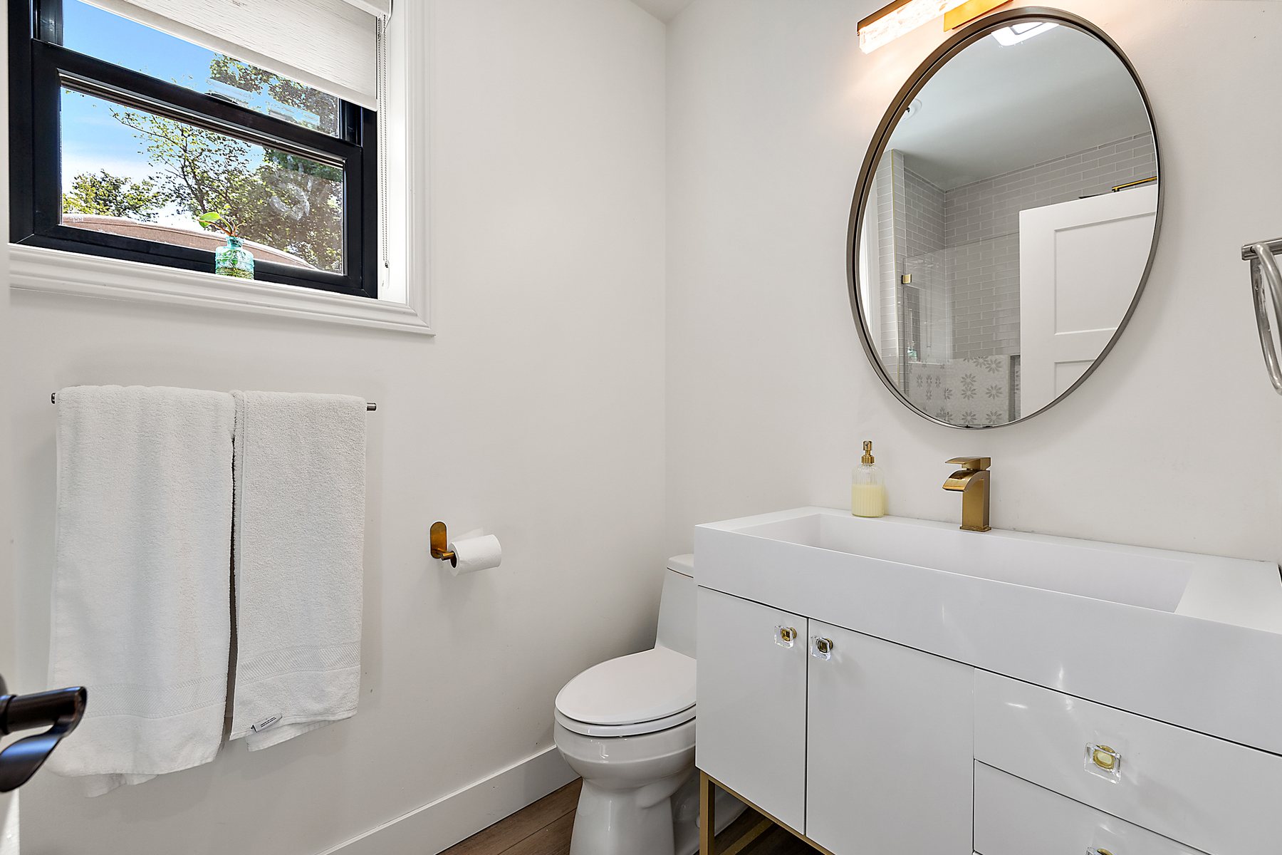 Finished bathroom fixture and vanity work